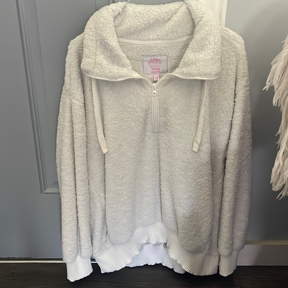 Member’s Mark Cozy Sherpa quarter zip pullover in off white.